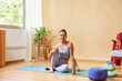 © ALTO IMAGES/Stocksy - Young brunette ready to do yoga