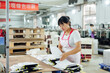 © ZQZ Studio/Stocksy - Woman in printing industry