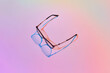 © Yaroslav Danylchenko/Stocksy - Stylish glasses with falling shadow.