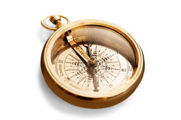brass antique compass on background