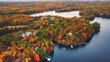 Fototapeta Na ścianę - Fall and autumn colours of the natural environments and landscapes of Eastern Ontario Canada.  Featuring forest, lakes and majestic vistas of scenic locations.  