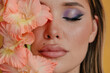 © Liliya Rodnikova/Stocksy - Closeup beauty portrait with closed eyes abd peachy flowers