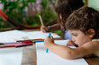 © Gemma can fly/Stocksy - Little girls drawing outdoors