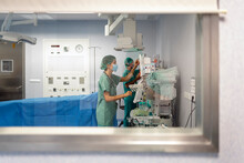 Medical Team Working In A Operating Theatre