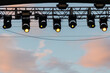 © VICTOR TORRES/Stocksy - Stage lights at concert during rock festival