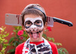© ACALU Studio/Stocksy - Portrait of child dressed up for halloween celebration