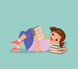 Wall Mural - Cute little girl reading book lying on the floor with head on stack of books 