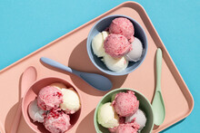 Vanilla And Raspberry Ice Cream Dessert In Bowls