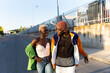 © Luis Velasco/Stocksy - Stylish Black Couple Outdoors.
