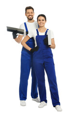 Sticker - Professional workers in uniform with putty knives on white background