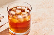 © Anna Tabakova/Stocksy - Iced whiskey drink