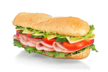 Wall Mural - Long baguette sandwich with lettuce, vegetables, ham, and cheese on white background