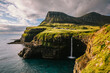 © Marcos Osorio/Stocksy - Water cascade falling into the sea in Faroe Islands