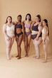 © Leire Cavia/Stocksy - group of real women empowerment- Body Positive