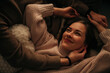 © Olga Moreira/Stocksy - Candid intimate moment of couple in love