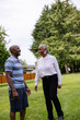 © Rob and Julia Campbell/Stocksy - Connected older couple enjoying timne together in the park.