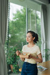 © Marc Tran/Stocksy - Businesswoman breakfast in the morning getting ready