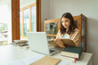© snowing12 - Education and literacy concept, College student girl reading lesson on laptop and taking notes
