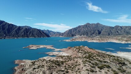 Poster - Scenery of calm blue lake with mountains in the background