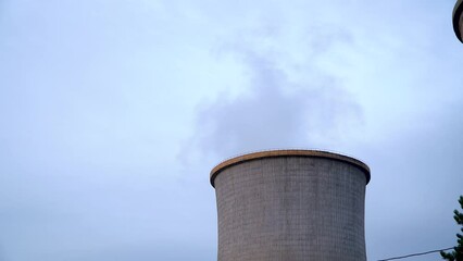 Wall Mural - The chimney of a thermal power plant, the smoke extracted by a thermal power plant on the chimney, in the production process. Environment. Pollution. 4k video.