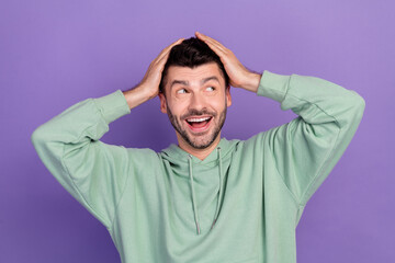 Sticker - Photo of young excited cute positive student man stubble touch his head surprised good news look empty space isolated on purple color background