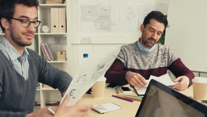 Wall Mural - Project management, architecture and collaboration with business people in meeting for engineering, designer and construction planning. Innovation, teamwork and review with employees in office