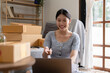 © itchaznong - Asian small business owner working at home office. Business retail market and online sell marketing delivery, SME e-commerce concept