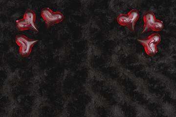 Wall Mural - Red hearts on black textured plush fabric