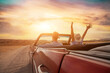 © Song_about_summer - happy people traveling in classic vintage car, couple during honeymoon