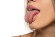 © vladimirfloyd - Side view of a woman tongue