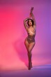 © Wisky - Graceful naked woman with glitter bodyart in neon light