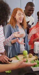 Poster - Vertical video of happy group of diverse friends preparing healthy drink in kitchen together