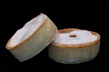 Two scotch mince or meat pies in round shell pastry just out the oven and ready to eat.