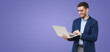 © Damir Khabirov - Horizontal banner of handsome smiling business man holding laptop, typing and browsing web pages