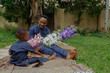 © Ruby Okoro - Nigerian father and little son at the park playing