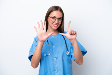 Wall Mural - Young nurse caucasian woman isolated on white background counting seven with fingers