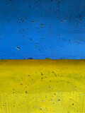 Fototapeta Na ścianę - Wall is painted blue and yellow. Ukrainian flag background