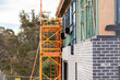 © Austockphoto - Scaffolding up around double storey new house build on construction site