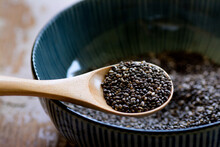 Nutritious Chia Seeds On A Wooden Spoon