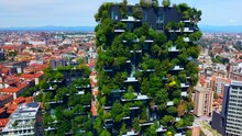 Aerial View Of Ecological Skyscrapers With Many Trees On Each Balcony. Bosco Verticale. Modern Architecture, Vertical Gardens, Terraces With Plants. Ecology. Green Planet. Milan. Italy, 01.10.2022