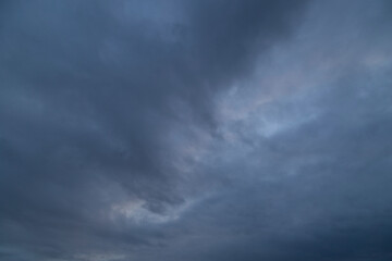 Wall Mural - background of the sky in stormy weather.dark sky in bad weather.