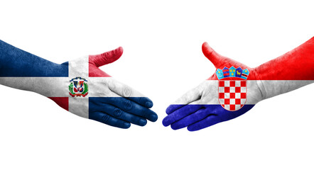 Handshake between Croatia and Dominican Republic flags painted on hands, isolated transparent image.