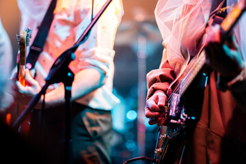 Poster - rock band playing guitar in a music gig in venue,