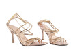 pair of beige high heel sandal shoes with glitter strap and zipper isolated on white background, sexy women strappy footwear, luxury femininity clothing fashionable