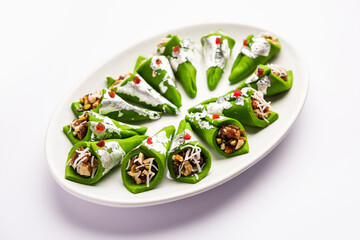 Kaju Gulkand Paan Mithai barfi - Indian sweet or dessert served in a plate