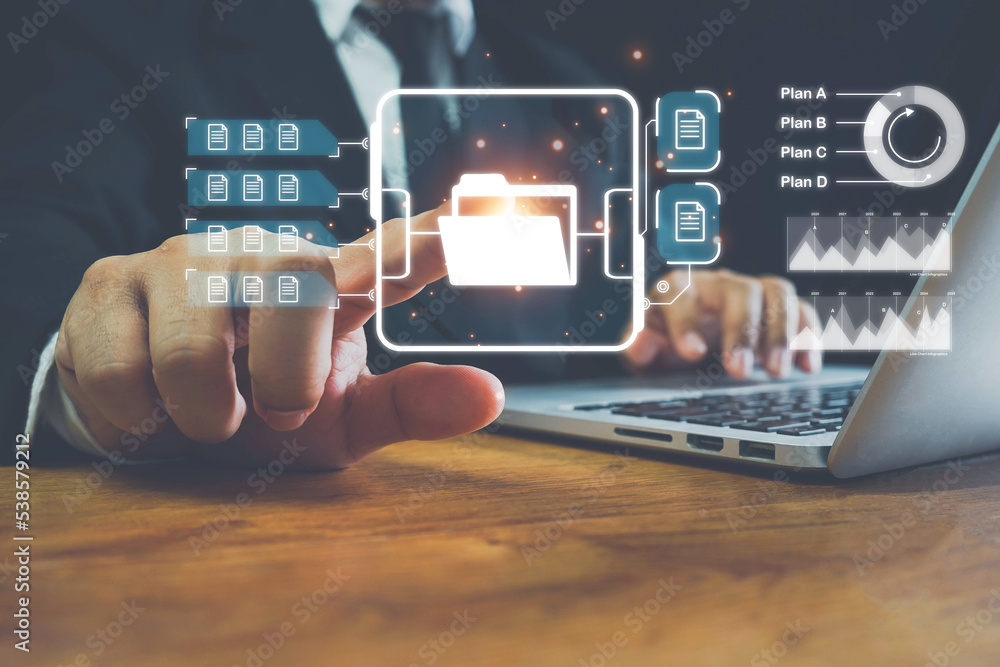 document management system concept, Businessman pointing folder and ...