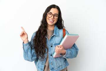 Wall Mural - Young student woman isolated on white background showing and lifting a finger in sign of the best