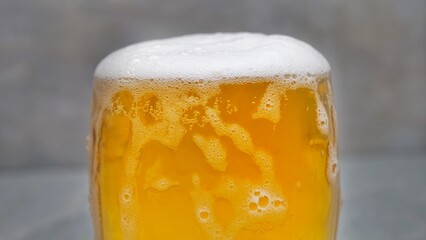 Macro Shot Of Pouring Beer Into Glass