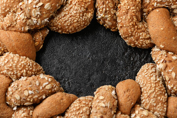 Fresh Homemade braided bread on rustic dark background