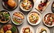 © Austockphoto - Overhead shot of multiple food dishes on table